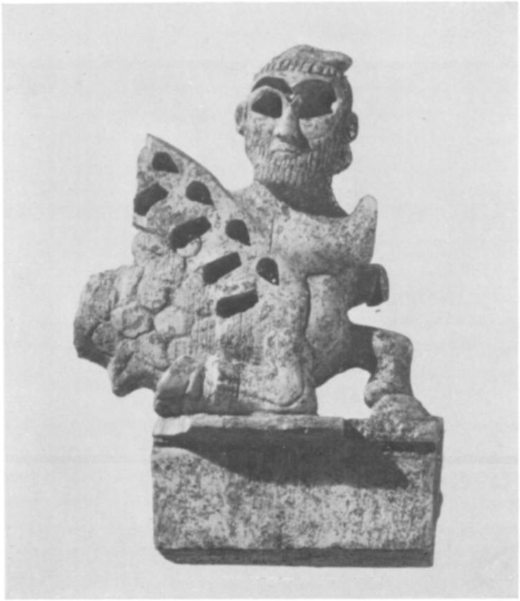 Fig. 27. Carved ivory ornament. The eyes, eyebrows, and wings were once inlaid in color.,iwiyeh, Iran, viii century B.C. Height 2 8 inches Fletcher Fund, 1951 Fig. 28.