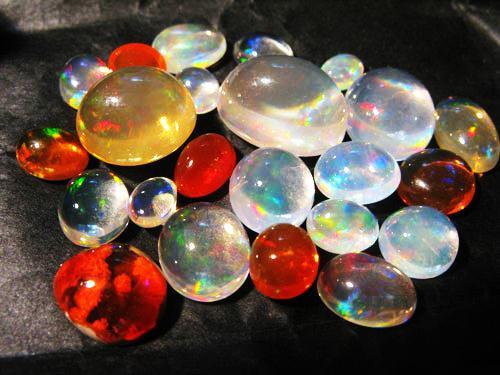 Decent quality Mexican opal TERMS FOR PLAY OF COLOR: Pinfire: Small close set patches of color. Harlequin: Broad angular, close set patches of color.
