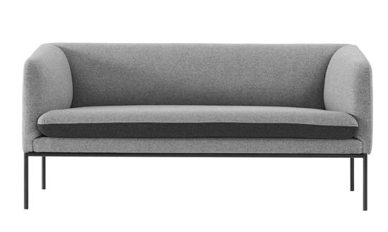 TURN SOFA This modern and multifunctional 2-seater is all about contrasts, as a strict sculptural outer shape complements a soft and inviting rounded inner.