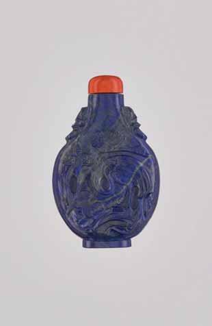 3 A LAPIS LAZULI CRANE AND TREE SNUFF BOTTLE, QING DYNASTY Lapis lazuli of good, intense color, with carving in high relief and multiple incised details, the surface with smooth polish and a good