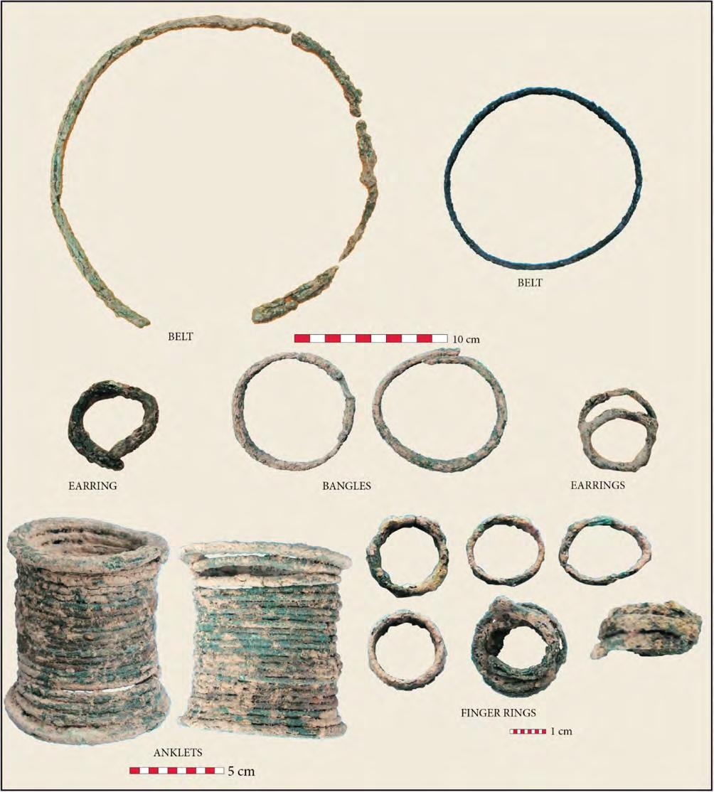 JOURNAL OF INDO-PACIFIC ARCHAEOLOGY 34 (2014) Figure 31: Bronze ornaments from Non Ban Jak burials. wealth in bronze jewellery associated with IA 3 and IA 4 individuals at Noen U-Loke.