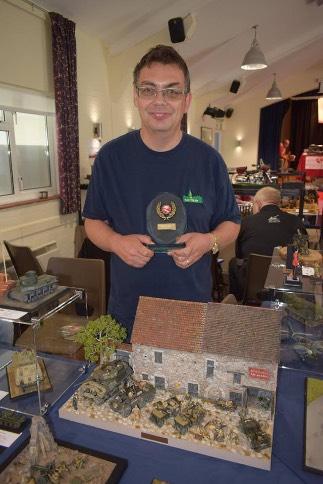IPMS SALISBURY NEWSLETTER Club News Rick with his Best in Show Trophy for his diorama: An Unexpected Bounty.
