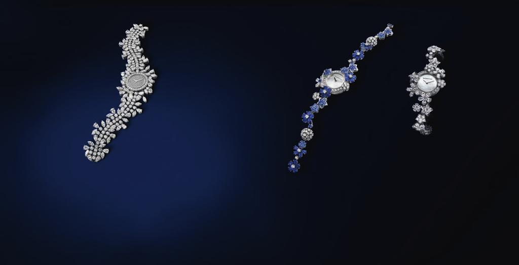 Folie des prés White gold case paved with diamonds, sapphires White mother-of-pearl dial Diameter: 23 mm White gold bracelet set with diamonds, sapphires White gold and diamond jeweller clasp 149