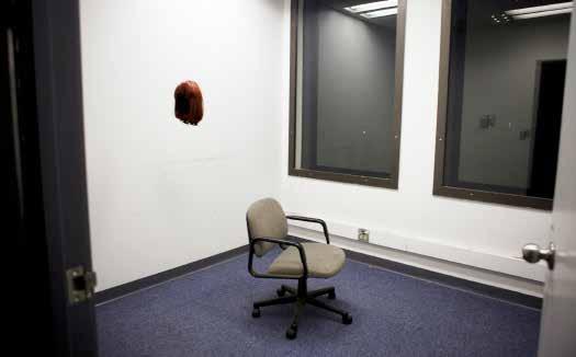 Ophelia wig, office chair - Ophelia s ghost activated through a text reading, 2015.