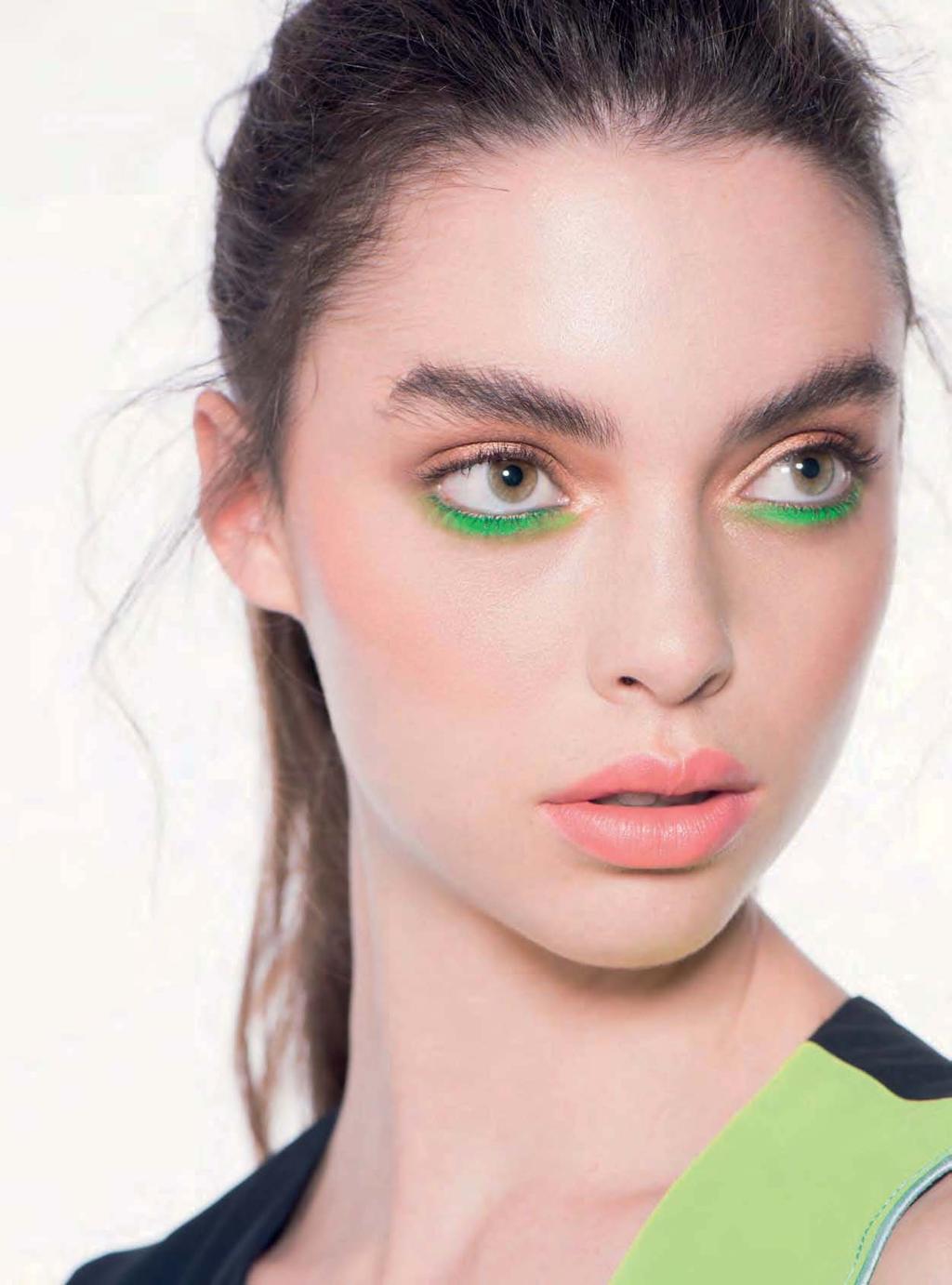 On the beauty front, if you are going for a summer festival look, a flash of neon across the lids, as seen backstage at Cividini and Wunderkind, or slick lines worn on the lower lids will definitely