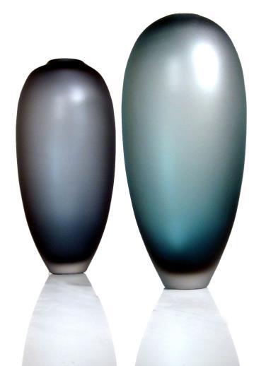 IKA IKA is a gradated oval vase perfect for an elegant floral arrangement.