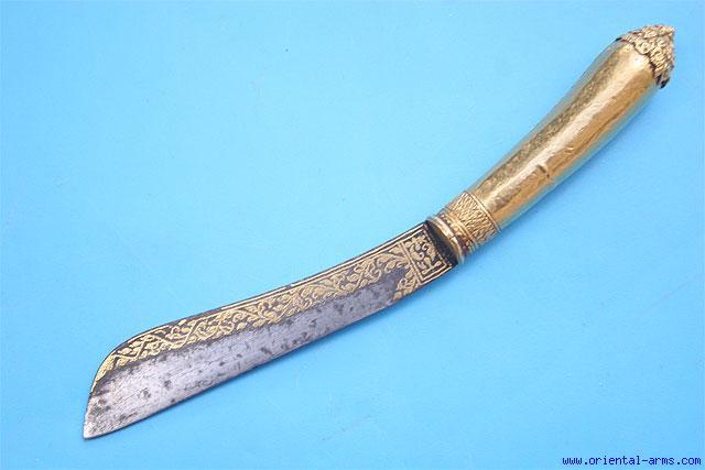 Up for sale is this small knife, from Thailand, late 19 C. this knife was 9095 most probably used to cut betel nuts. Blade 4 inches nicely decorated with gold koftgari work, Gold mounted handle.