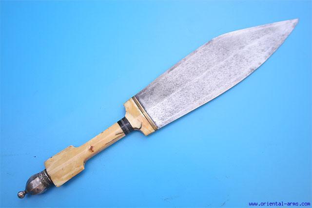 The handle is ivory with good age color. Fur 78 covered hide scabbard. Total length 11 ½ inches. Very good condition. An interesting fine and rare dagger.
