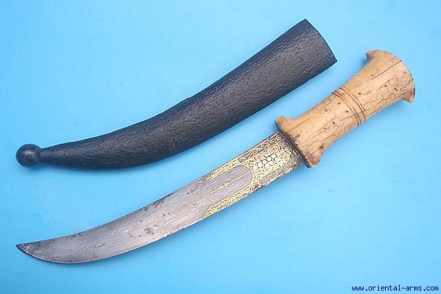 Up for sale is this early, probably mid to late 17 C. Jambiya Dagger from Turkey. The 9 ½ inches blade is forged from very fine Sham steel, a form of wootz steel used for blades in the Ottoman empire.