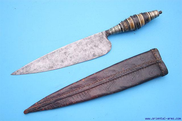 Wood scabbard covered with black leather and ball 5 shaped horn tip. Very good condition to age. Few blackened spots on the blade and minor losses to the gold koftgari work.