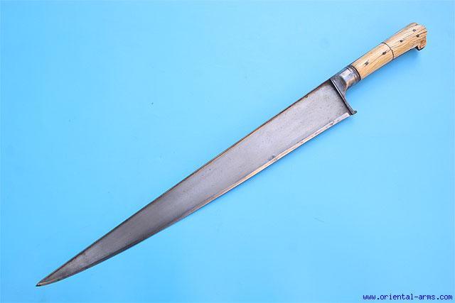 This fine short sword is coming from North India. It is in the style known as Khyber sword, but similar swords are found all over the region.