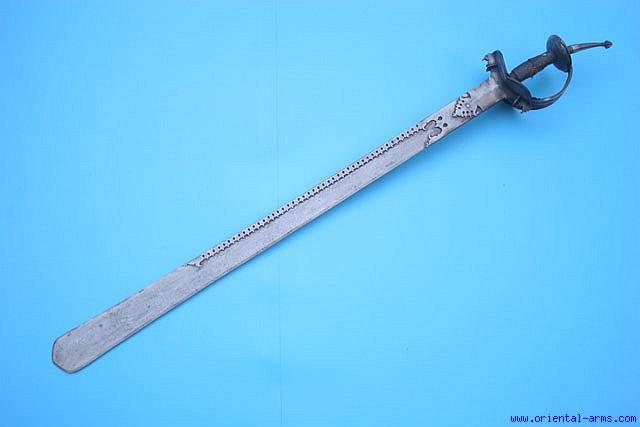 Up for sale is this very good Khanda sword, 18 C. or earlier, with a 32 inches blade forged from very fine pattern welded ( Damascus) steel.