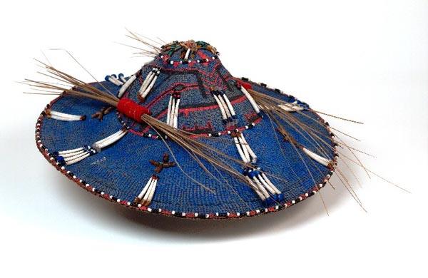 Anthropologists believe that the Alutiiq artists adopted this style of hats from the Tlingit Indians.