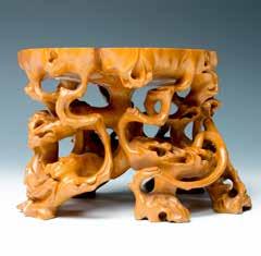 5cm $300-$400 148 二十世纪染色仿树根支架 Of upright cylindrical form, carved shape