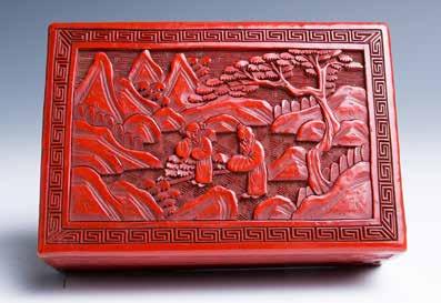 2cm Of rectangular form, the flat cover deeply and crisply carved with a scholar strolling with his attendant carrying a bag on a stick, within a landscape of mountains and trees, the sides