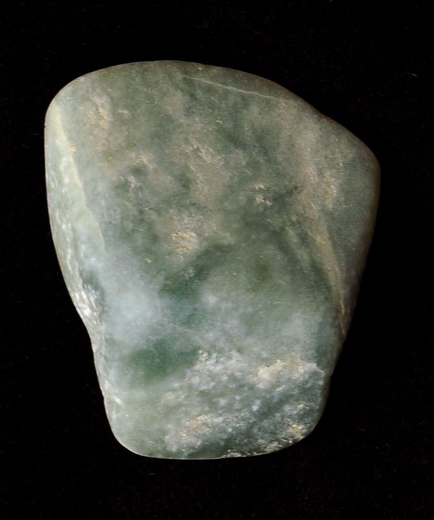 A small, well-polished axe made of dark green stone was found along the east-west axis of the E-Group roughly 30 cm north of Caches 154 and 155 under Floor 12b (see below).