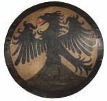 224 225 226 224 A RARE PAINTED CIRCULAR SHIELD IN 15TH CENTURY STYLE, LATE 19TH CENTURY of canvas covered wood, the outer face painted with a broad black frame, charged, or an eagle displayed sable,