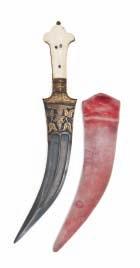 45 46 47 45 AN INDIAN DAGGER, 19TH CENTURY with curved double-edged blade of watered steel, reinforced at the tip and cut with a pair of broad fullers on each side, decorated with gold koftgari