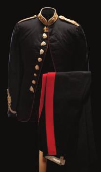 182 183 182 AN OFFICER S FULL DRESS TUNIC AND UNDRESS OVERALLS, ROYAL ARTILLERY, 1869-72 the tunic of dark blue wool, with scarlet collar and gold lace, round-cord and gimp, the collar bearing a