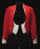 189 A LIEUTENANT S MESS JACKET AND HOT-WEATHER VEST, WEST INDIA REGIMENT, CIRCA 1902-11 the jacket of scarlet wool, with white cuffs and a tawny/orange, corded-silk shawl collar, lined in