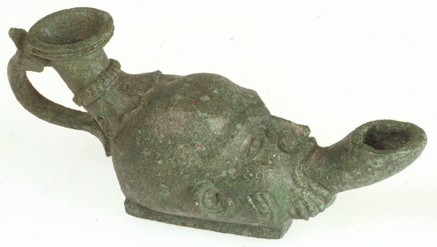 Fig. 1.5. Bronze lamp depicting a Silenus from the mithraeum at the southwestern periphery of the vicus of Tienen, Grijpenveld. Photo Harry Spelmans, Erfgoedsite, Tienen.
