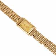 movement signed on the reverse, case back numbered 31060, hallmarked 9ct, on a 9ct gold mesh bracelet. 33.