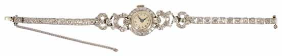 An 18ct white gold and diamond set Vorterx 1940s cocktail watch the circular dial within a single row of diamonds and with diamond set lugs, attached to a narrow