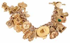 A 9ct gold charm bracelet with a rose gold chain and numerous charms, including cased solitaire engagement ring and wedding ring, lantern, coronation coach etc., 97 grams 900-1,200 267.