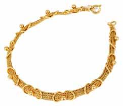 carat). Approx. weight 16.9 gm 250-350 273 275. A fancy link yellow metal charm bracelet marks rubbed.