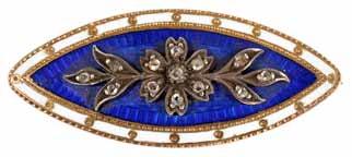 enamel border with gold detail, glass locket to reverse, tests for gold, measures approx. 3.25cm width, weight 5.3 gm approx. 100-200 291.