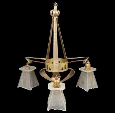 An Arts and Crafts triple hanging light with metal hanging body fitted with three glass shades. height approximately 58cm 3.