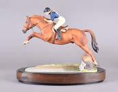 100-150 329. A Royal Worcester figurine, Merano and Cap Raimondo d Inzeo 200-300 333.
