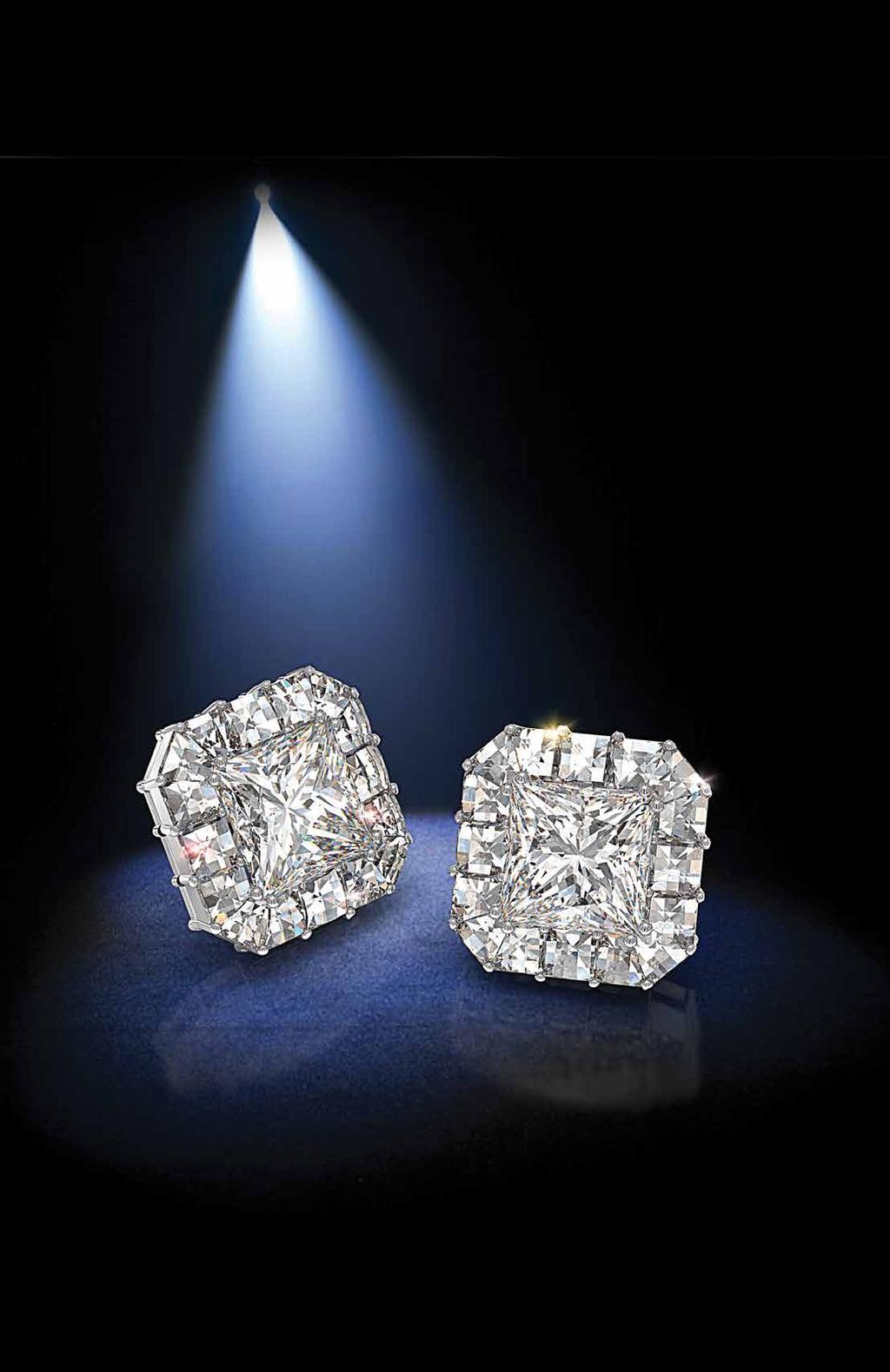 Earrings of Fire Earrings of Fire with Blaze diamonds around princess centers. A. Ring of Fire features our exclusive diamond halo.