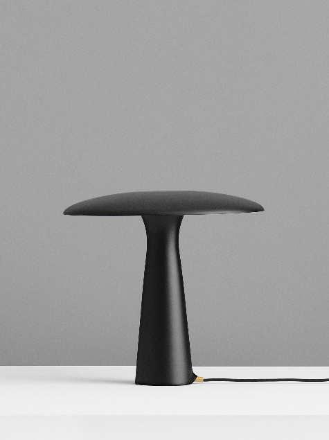 52 Shelter Shelter is a simple, characterful table lamp that emits a cozy light onto its surroundings.