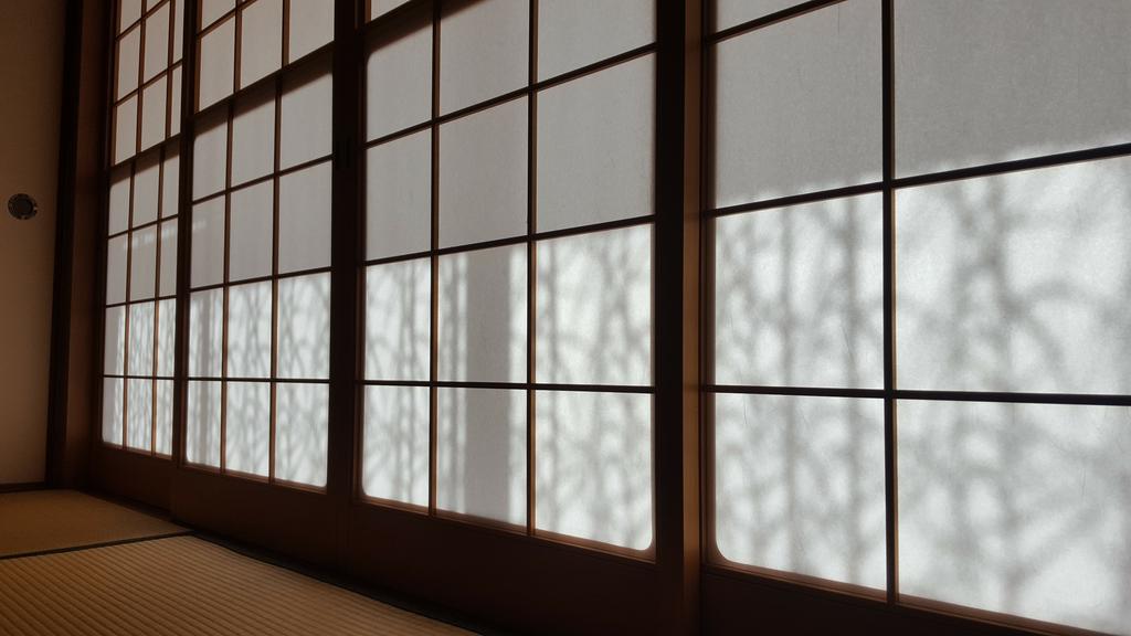 Shoji allow and encourage natural light permeation, and consist of a translucent sheet of washi stretched taut over a timber frame, with the washi holding together a lattice of timber or bamboo