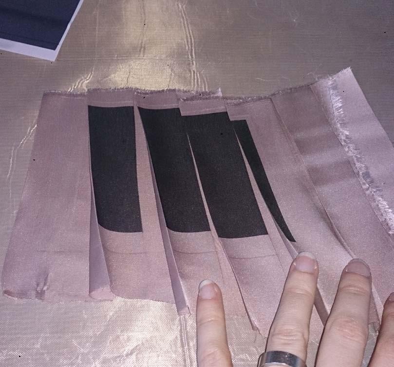 Underneath the white square the print is inverted and the fabric is