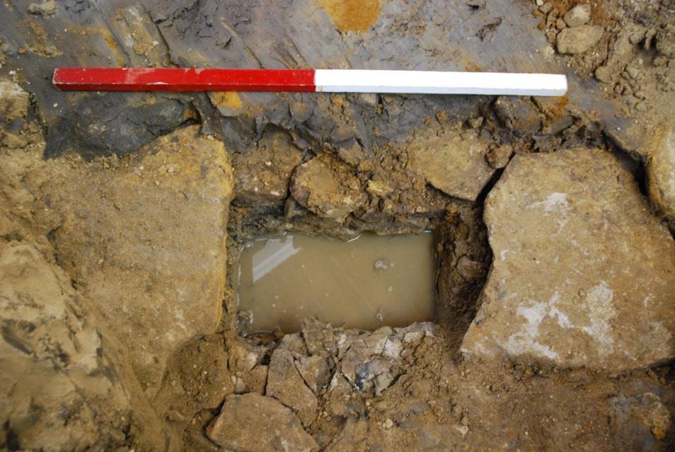 At a depth of about a further 600mm two limestone-lined and limestone-capped drains were uncovered (Figs 9, 10 and 11).