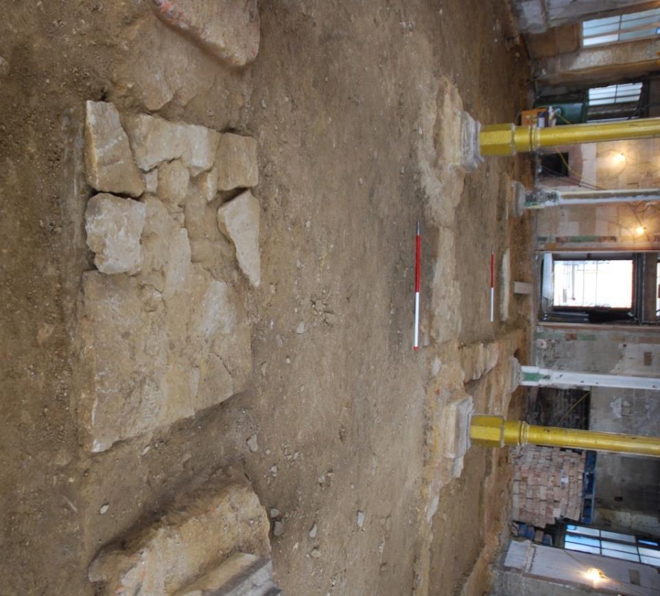 At the north-east corner the floor had been destroyed by the introduction of a modern sunken plant-room, which had also destroyed earlier remains beneath.