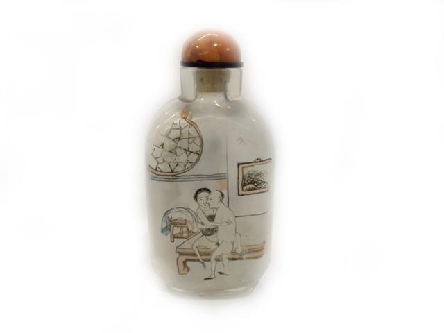 A Lovely Bonus An inside-painted glass snuff bottle painted with an