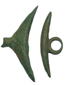 The copper-alloy brooches were found linked together and were almost certainly a paired set. In association with these brooches was found a rim sherd of a greyware jar.