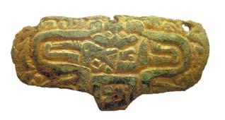 A sixth-century wrist clasp (LVPL-F15235) from Foxley, Norfolk (50 x 25mm) two possible circular scars on the reverse, one below the mask and one above, perhaps the remains of integrally cast rivets