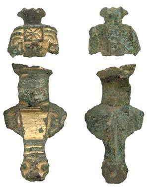 This brooch is not exactly like any Kentish brooch, however, and has closer affinities with imitations made outside Kent, such as the brooch excavated at the cemetery of Winnall II (Grave 21),
