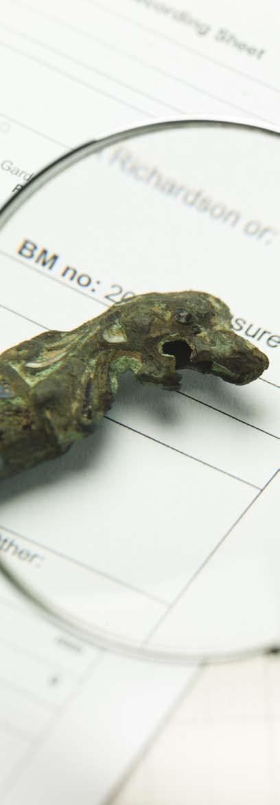 A late fifteenth- or early sixteenth-century strap-fitting in the form of a jester s head from Severn Stoke, Worcestershire A large copper-alloy strap-fitting in the form of a jester s head