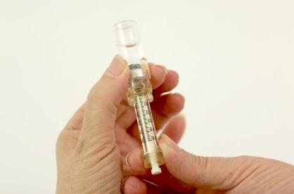 Remove sterile Safety Syringe from package maintaining sterility of