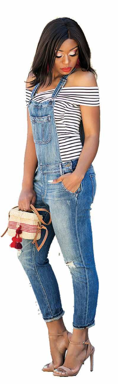street style stars who regularly step out in slim fitting denim overalls and pairing them with sleek staples like blouses and