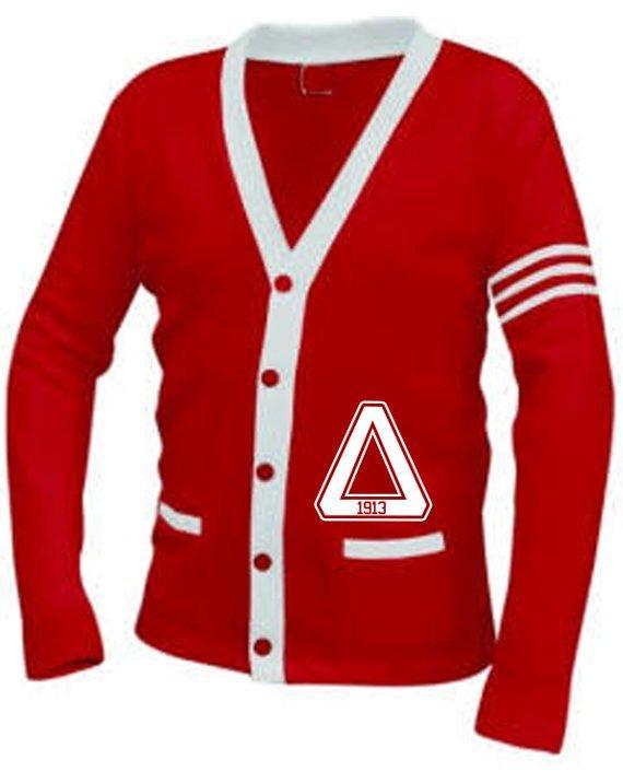Delta Symbol Varsity Cardigan Price: 109 TAKES 3-4 WEEKS TO MAKE UNISEX JERSEY KNIT V-NECK POCKET CARDIGAN 100% acrylic Pill resistant Machine wash and dry 5 dyed-to-match buttons 2 large pockets