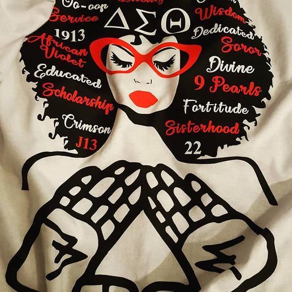 DST Words in Afro Shirt Price: 25 Shirt Information Sheet Rhinestone T-shirt. Customization is available for any shirts. Email us at blingthatsingz@gmail.com for more information.