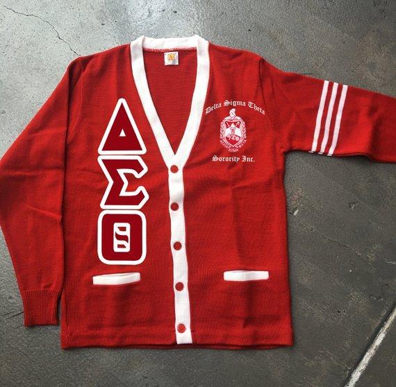 Delta Sigma Theta Varsity Cardigan Price: 129 TAKES 2-3 WEEKS TO MAKE UNISEX JERSEY KNIT V-NECK POCKET CARDIGAN 100% acrylic Pill resistant Machine wash and dry 5 dyed-to-match buttons 2 large