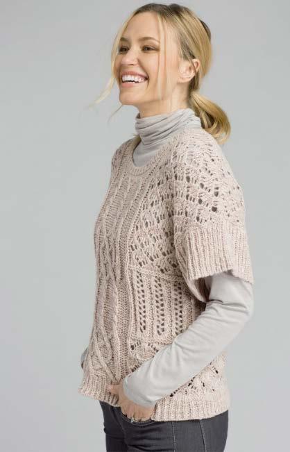 Sweater Weather Summer clothing can seamlessly transition into fall fashion with a chunky sweater.