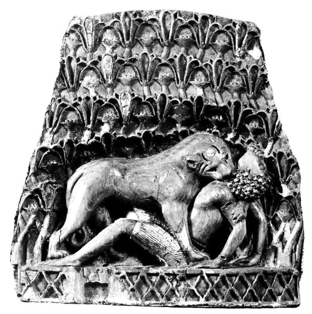 Figure 9: Ivory furniture inlay of a lion attacking an African man. Phoenician work for Assyrian patrons, found at Nimrud, later 8 th century B.C. Photo after Garbini, fig. 84.